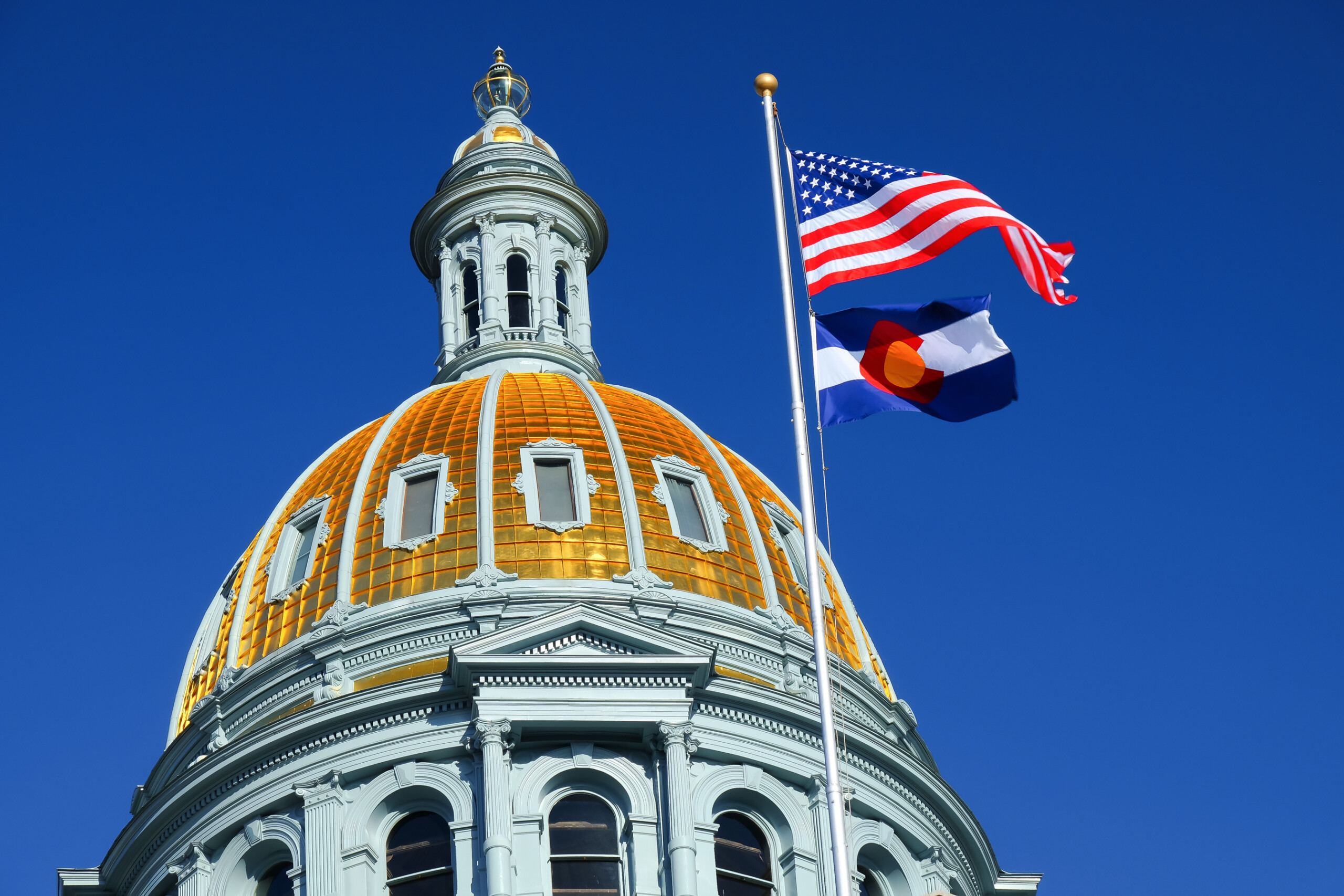 The,American,And,Colorado,Flags,At,The,Colorado,State,Capitol / Fly Tucson